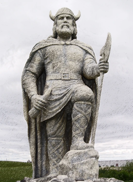 statue of old man with beard holding staff and wearing large helmet