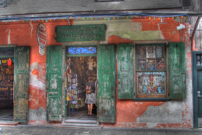 two people are outside of an old building