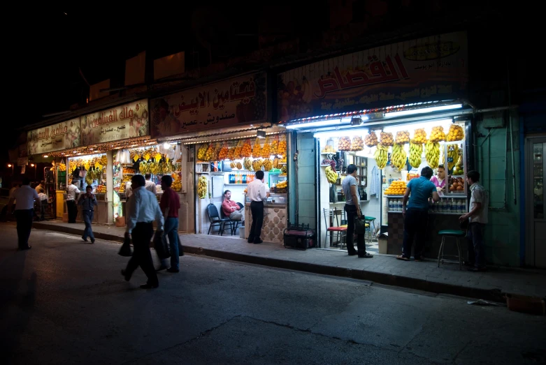 a shopper's market in an urban area at night