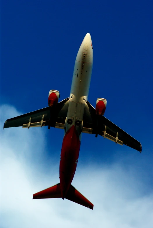 a plane flying in the sky at high altitude