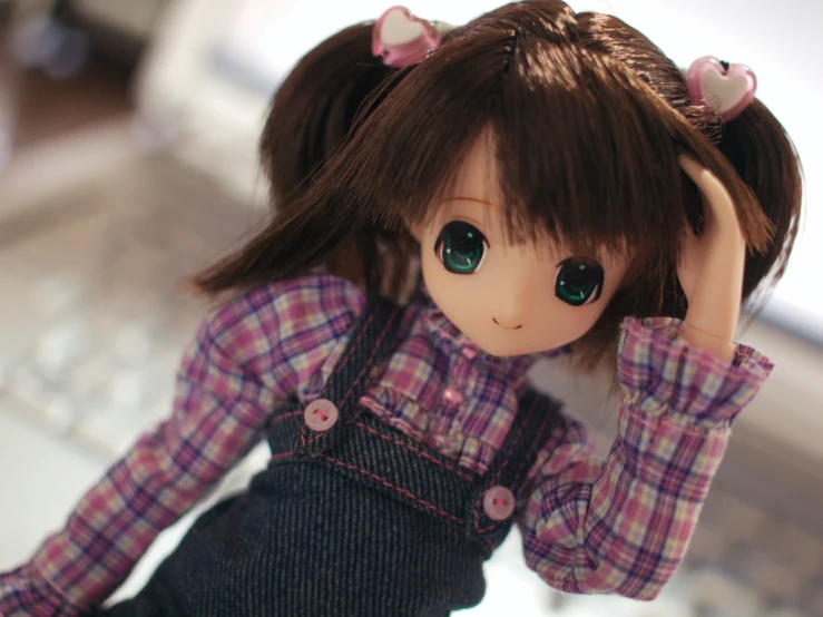 a doll that has a very cute outfit