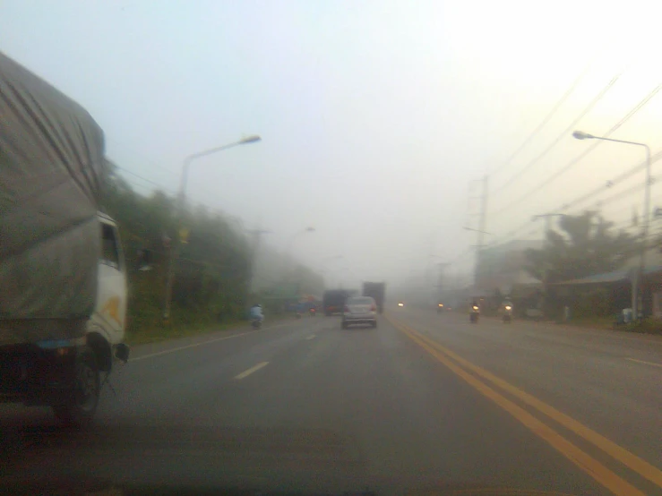 a po taken in a moving vehicle looking back at traffic