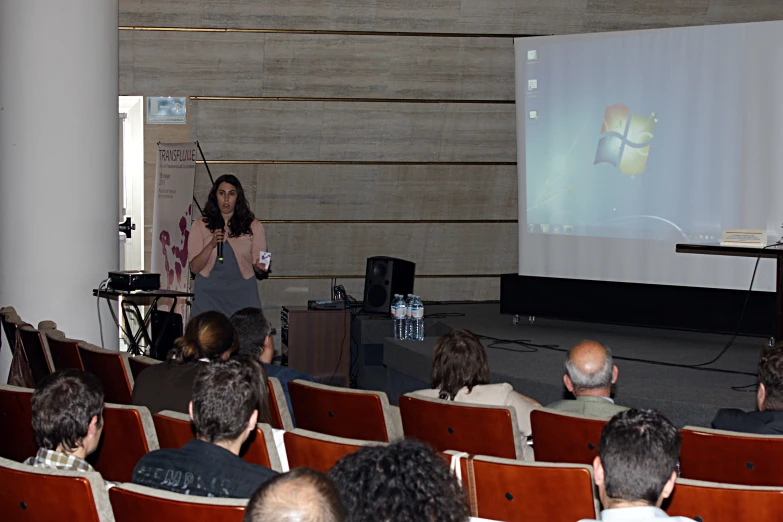 a person standing in front of an audience