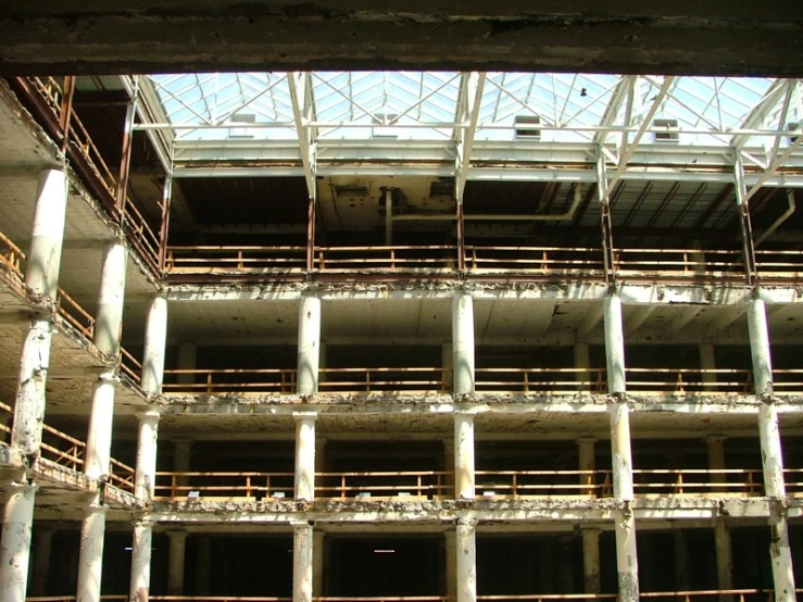 a large concrete building with balconies inside of it