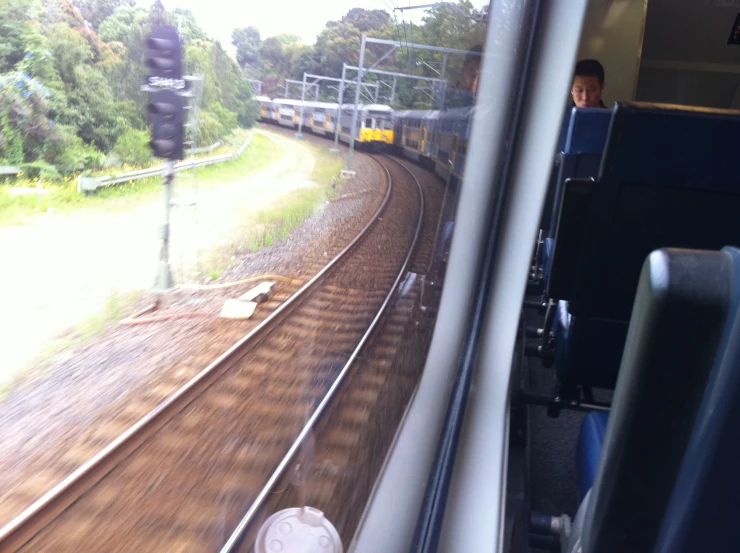 the view out the train window on the rail road tracks