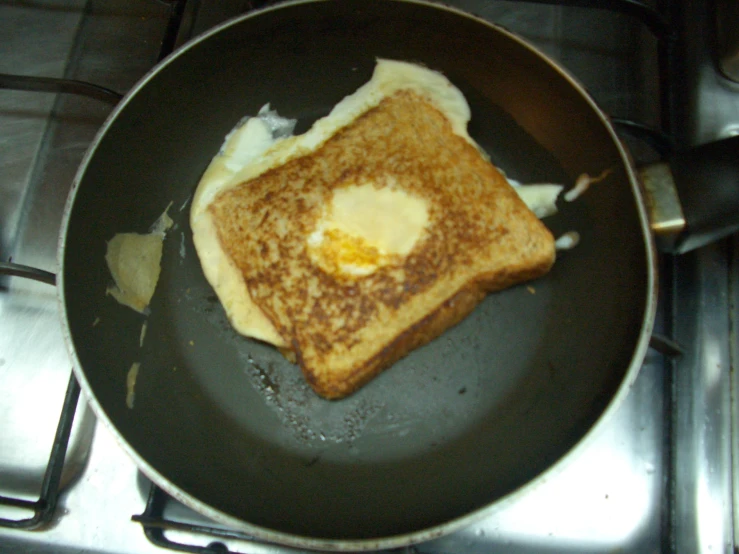 breakfast of french toast and eggs in pan