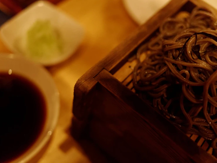 a close up of a wooden box with food on it