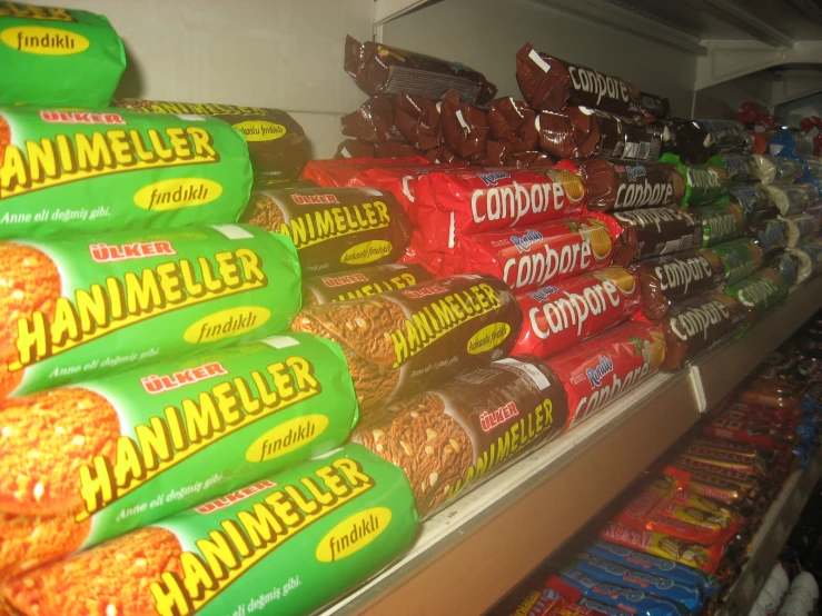 a shelf full of food products and a large bag of rammelee
