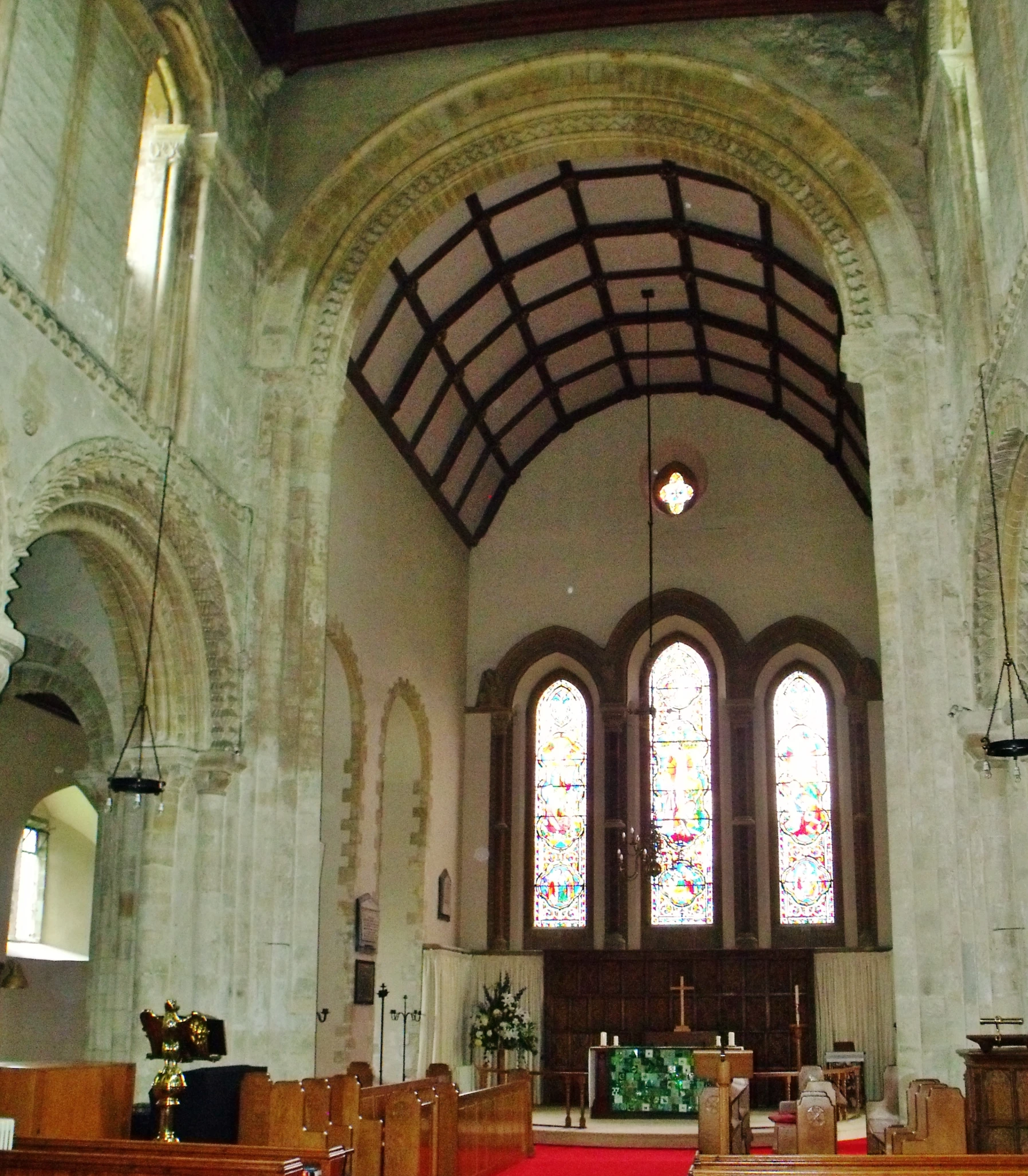 large cathedral interior with stained glass windows