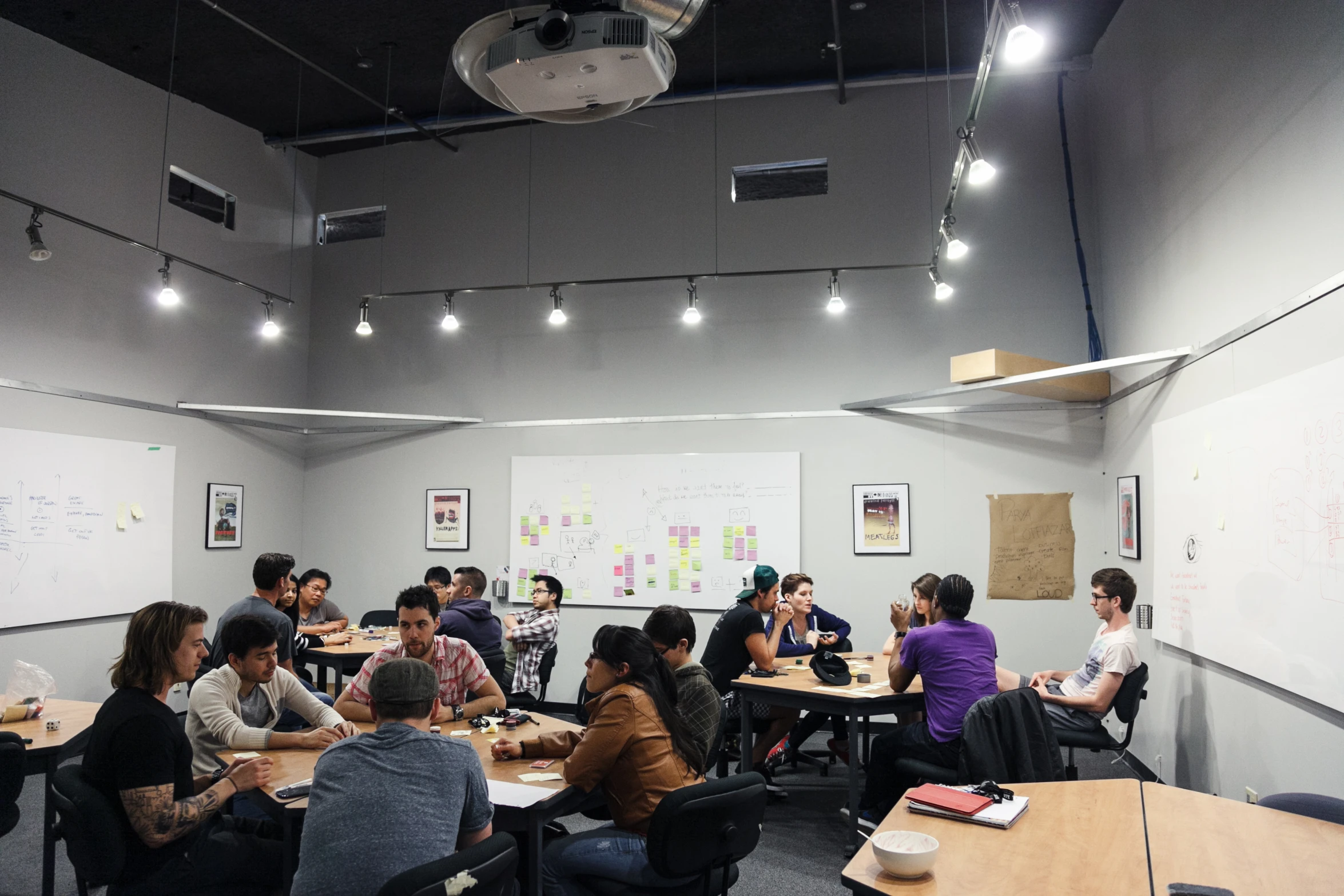 the room is crowded with people sitting at their tables