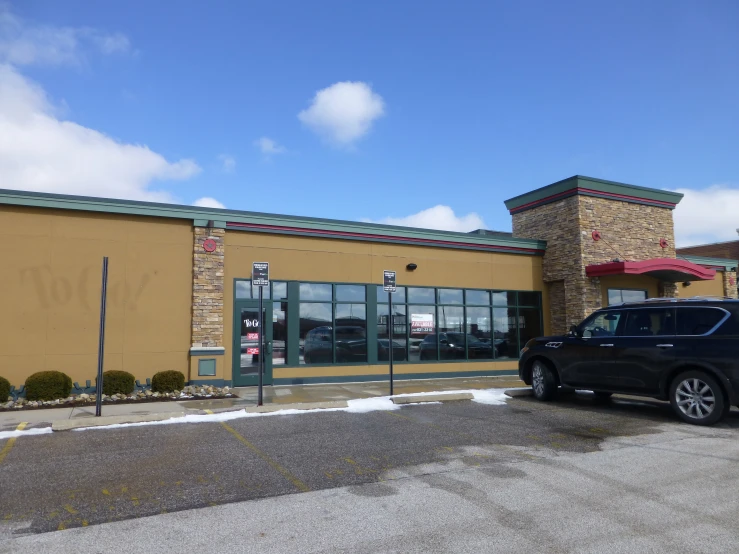 a truck parked in front of a store