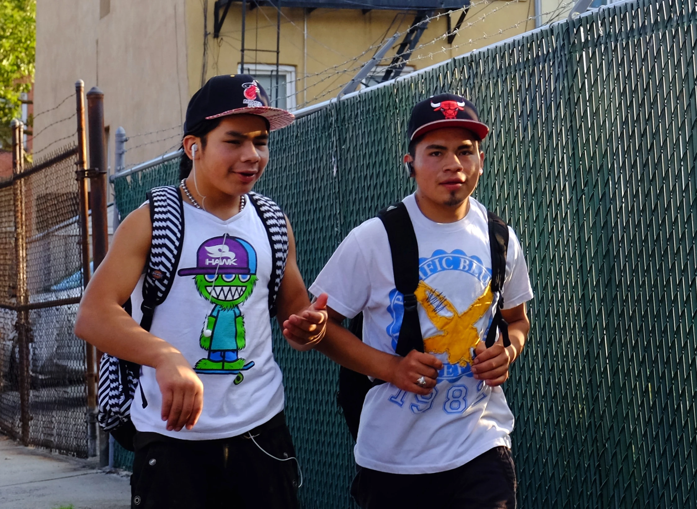 two young men standing next to each other