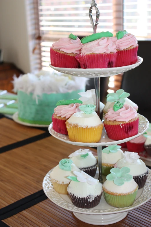 a close up of some cup cakes on two plates