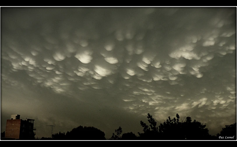 dark clouds are filled with small white dots