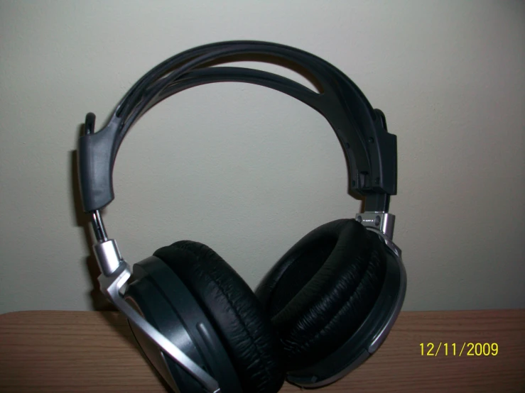 the headphones are black with a white stripe