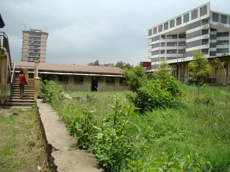 a building sits near a grassy area