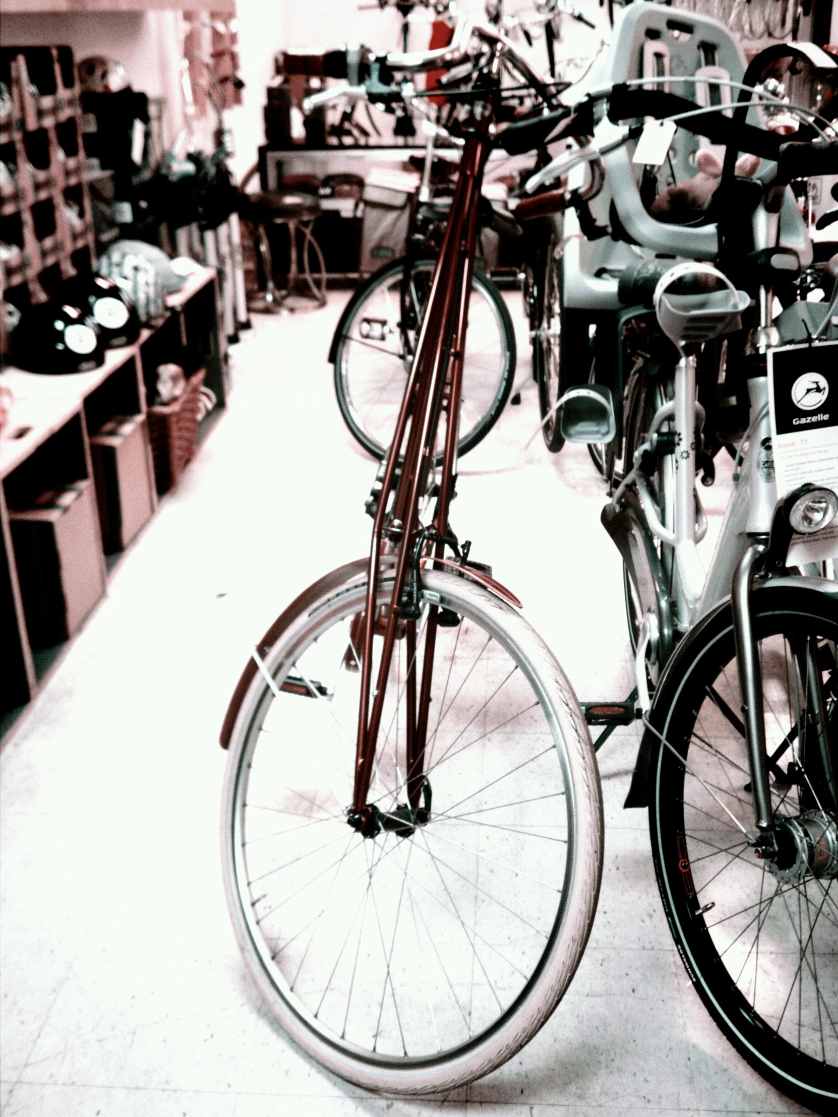 a bicycle is locked inside of a bicycle shop