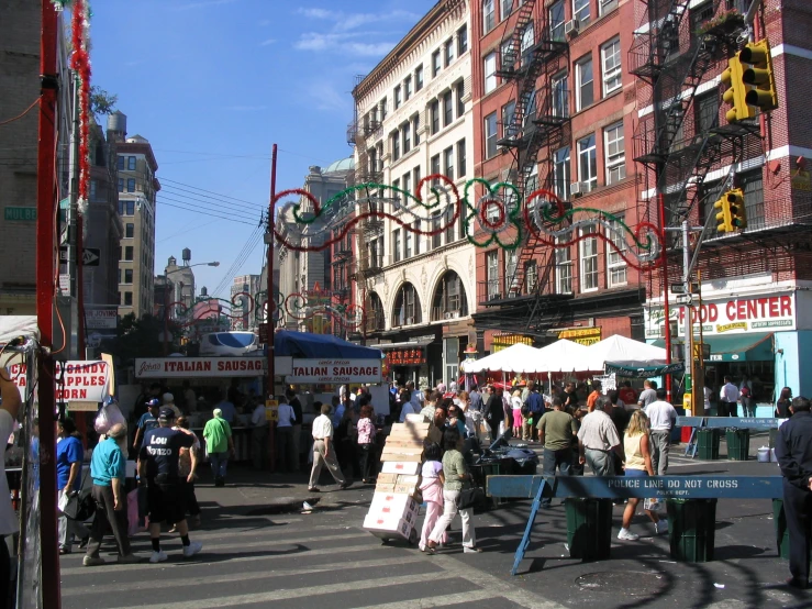 a group of people walking around in a city