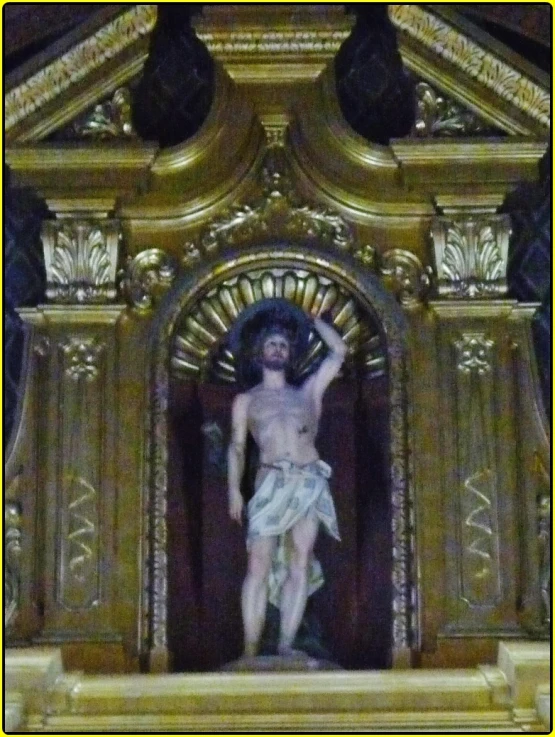 an artistic image of the crucifix in gold