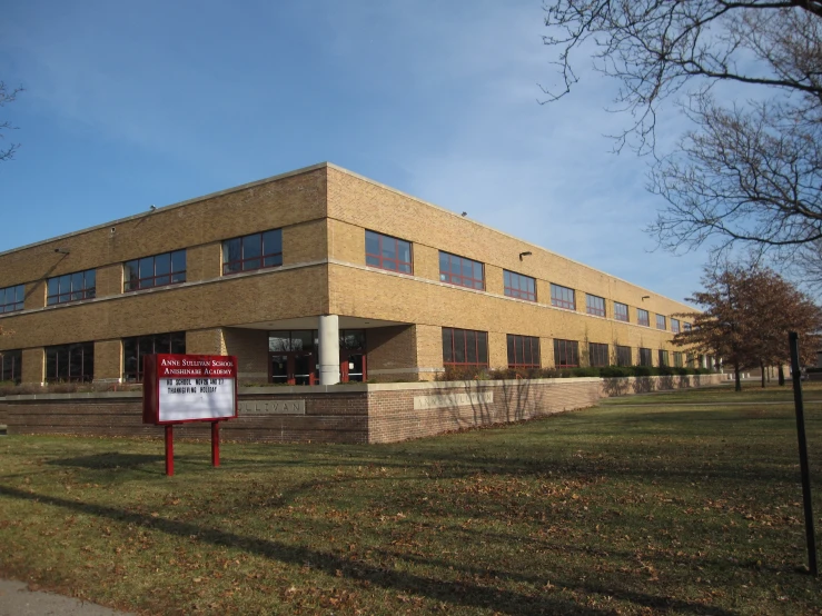 a building sitting next to the side of the road