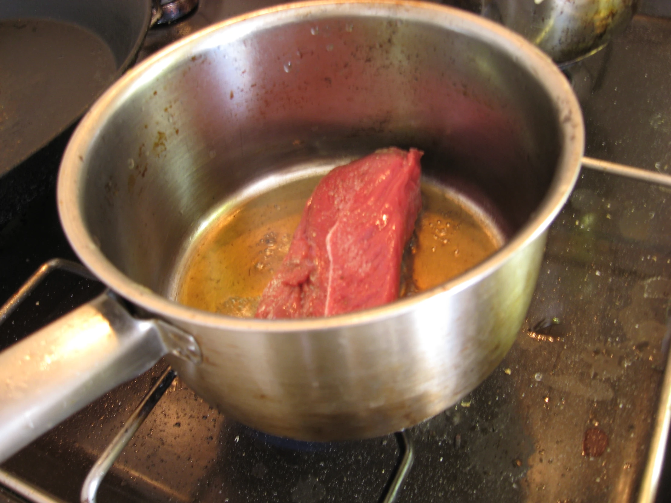 an image of beef soup in the kitchen