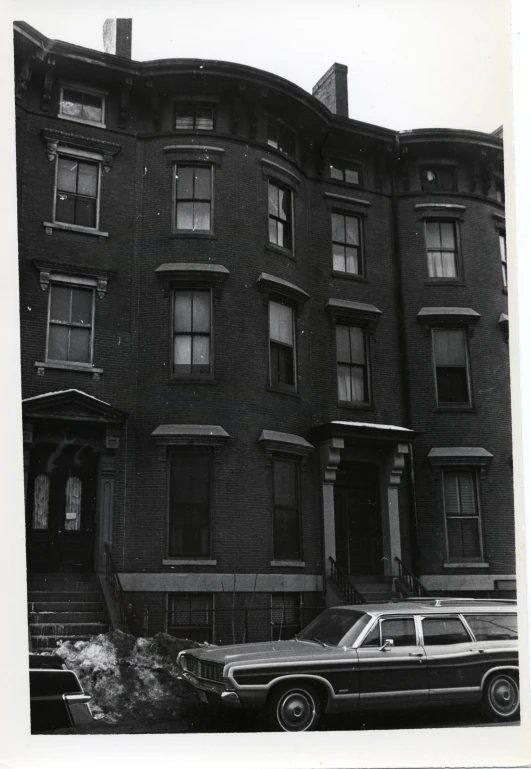 a old pograph of a large brick building