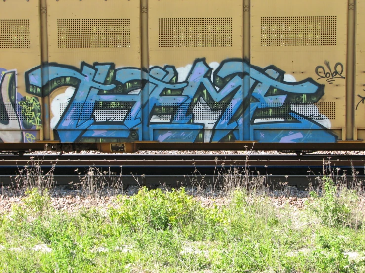 an image of graffiti on the side of a train