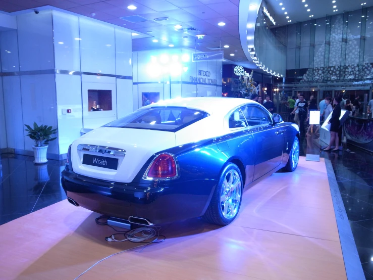 a car that is on display at the show