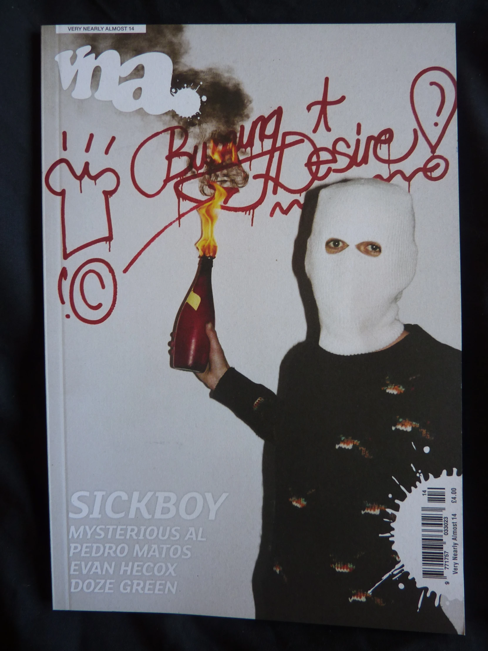 magazine cover featuring the image of an individual smoking a red hook