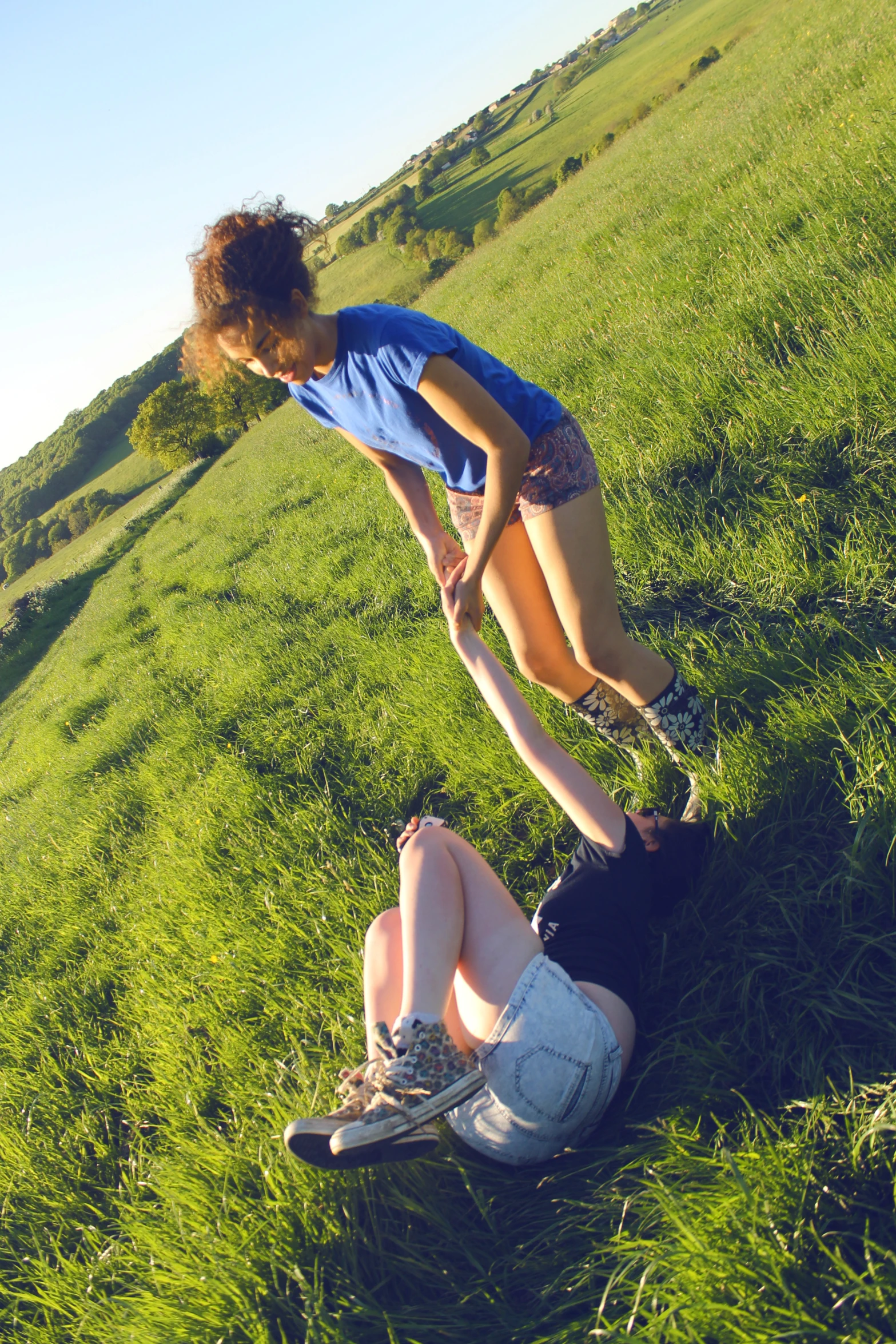 a woman is being dragged off the ground by a man