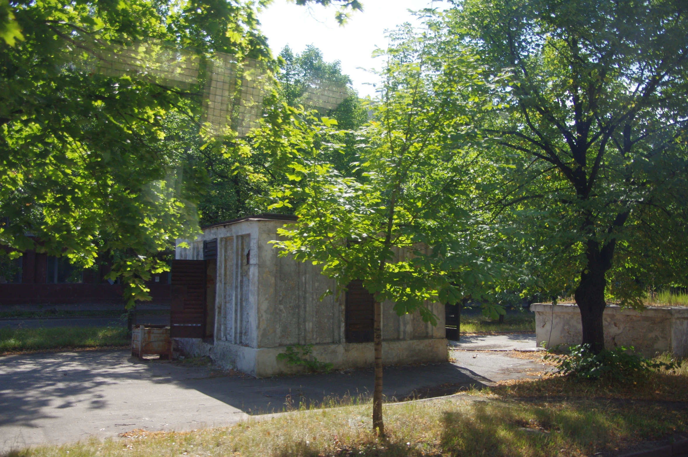 there is a old shed in a lot that is not quite being used