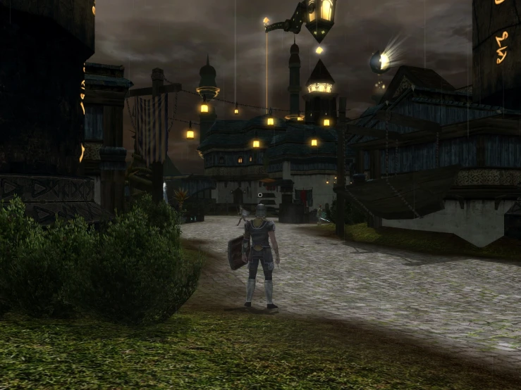 a guy walking down a path towards a clock tower