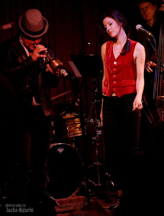 an image of a woman playing a trumpet