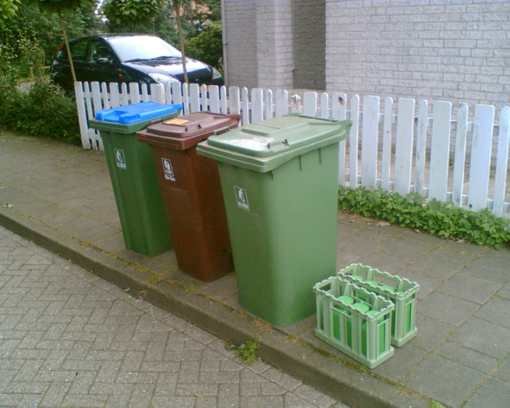 three trash can't outgrund each other outside