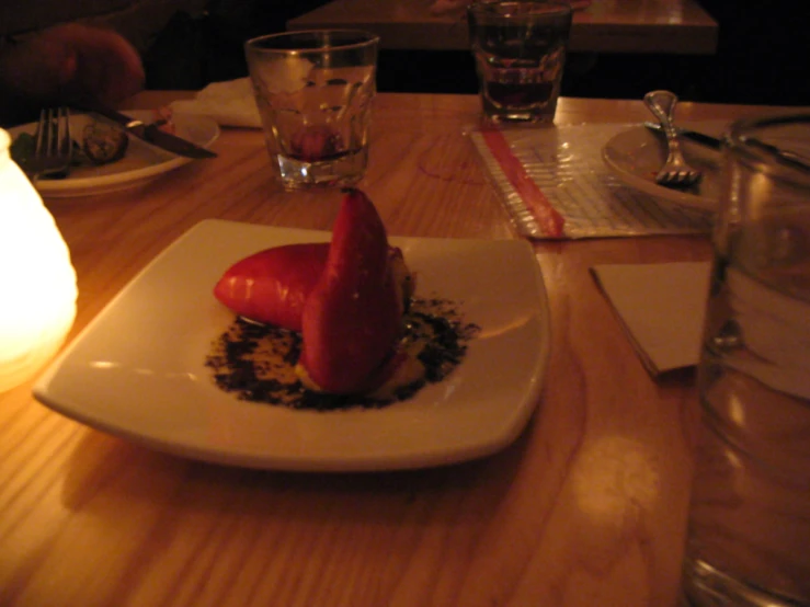 a white plate with food sitting on top of a table