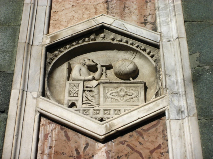 the emblem is displayed on the front of the building