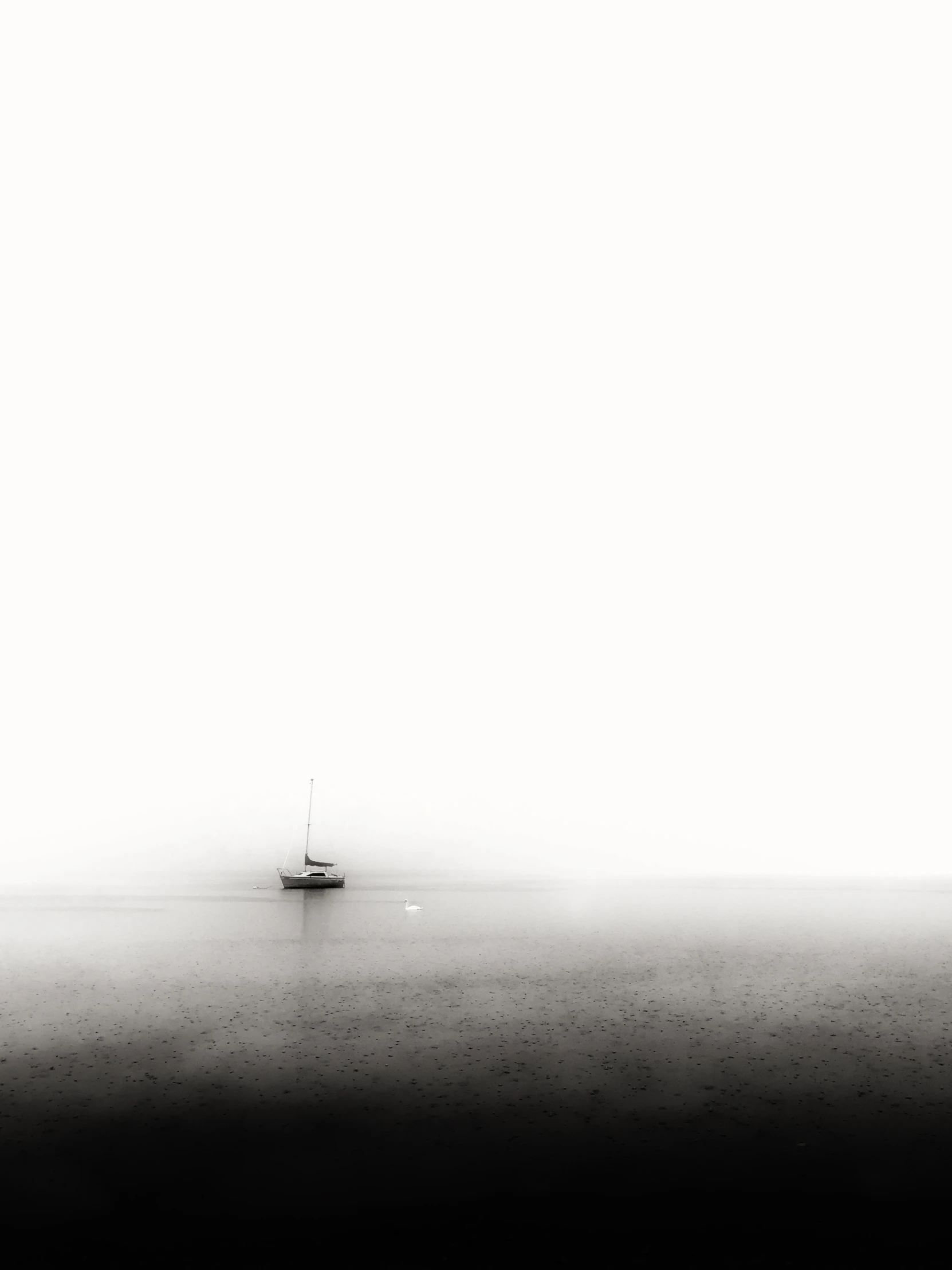 a lone boat out on an empty lake