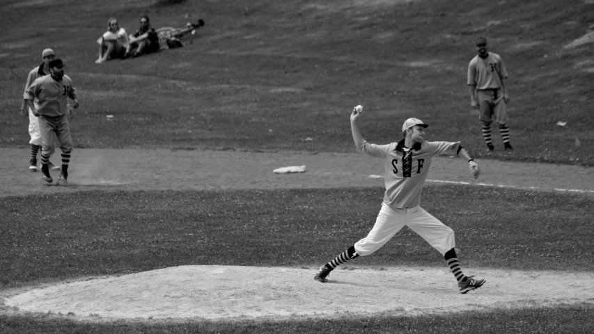 two people on a field playing baseball together