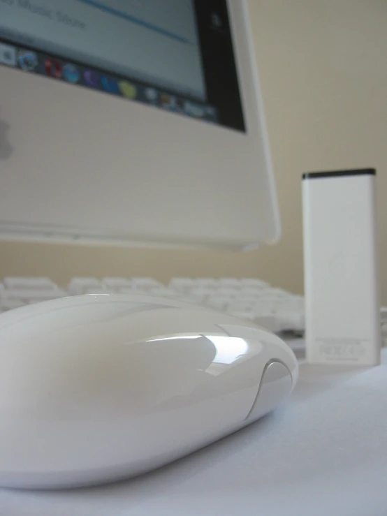 a keyboard and mouse sit next to a computer monitor