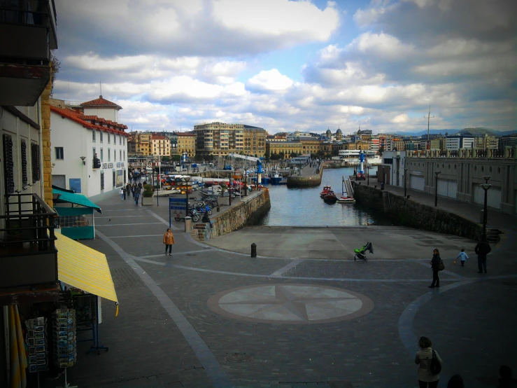 the small river runs through town and is close to the marina