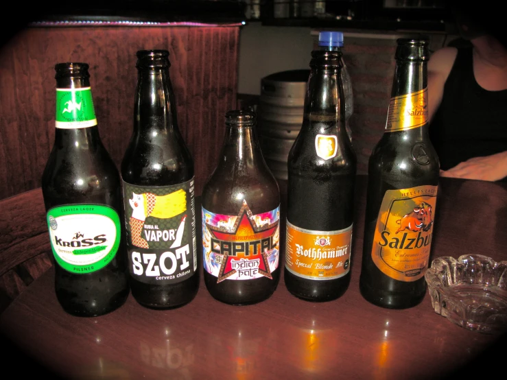 a group of six beers sitting on top of a table