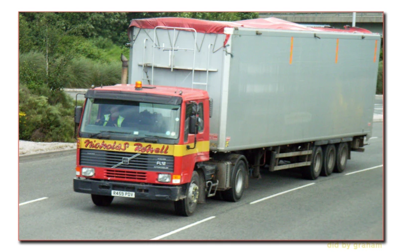 a very big truck that has a small bed in the back