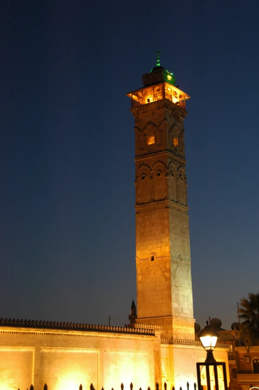 the tower of a large building with a clock on it