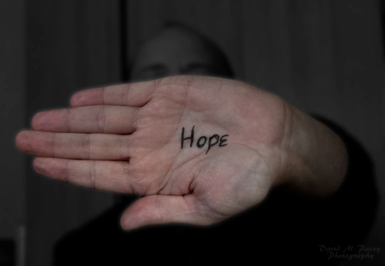 the words hope written in a black - and - white po