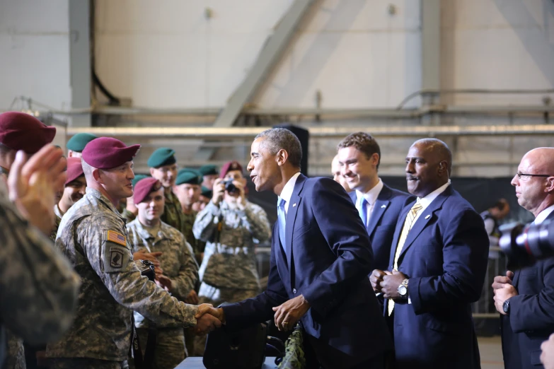 the president and several people in a large building