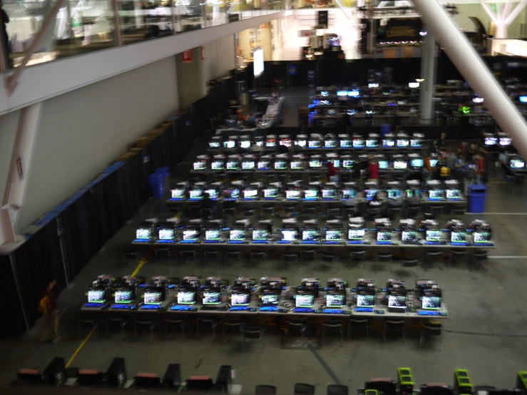 a room with a big bunch of monitors on them