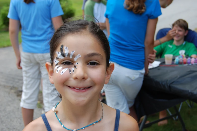 an image of a girl that has face painted