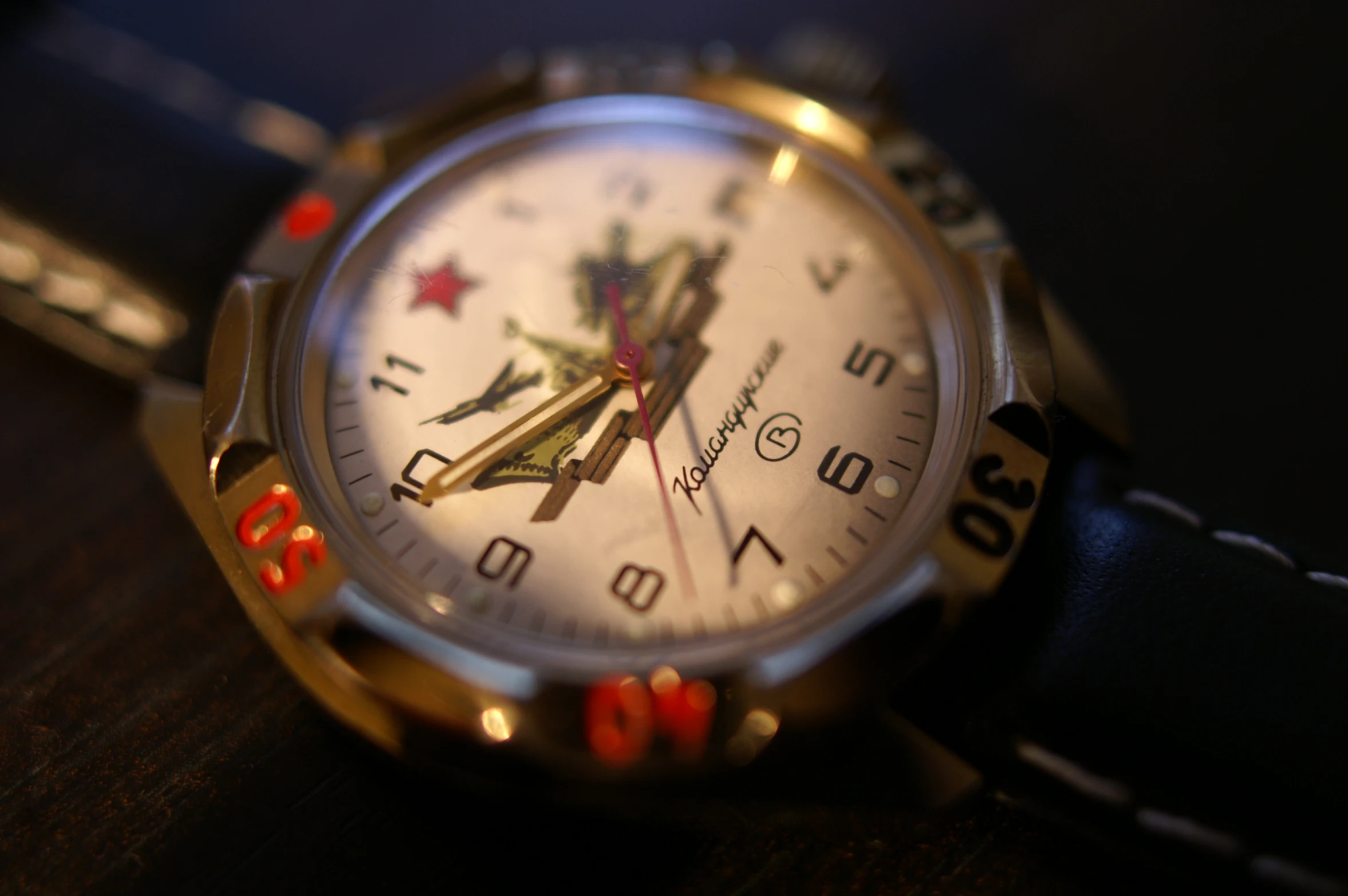 the white timepiece is displayed on the wrist watch