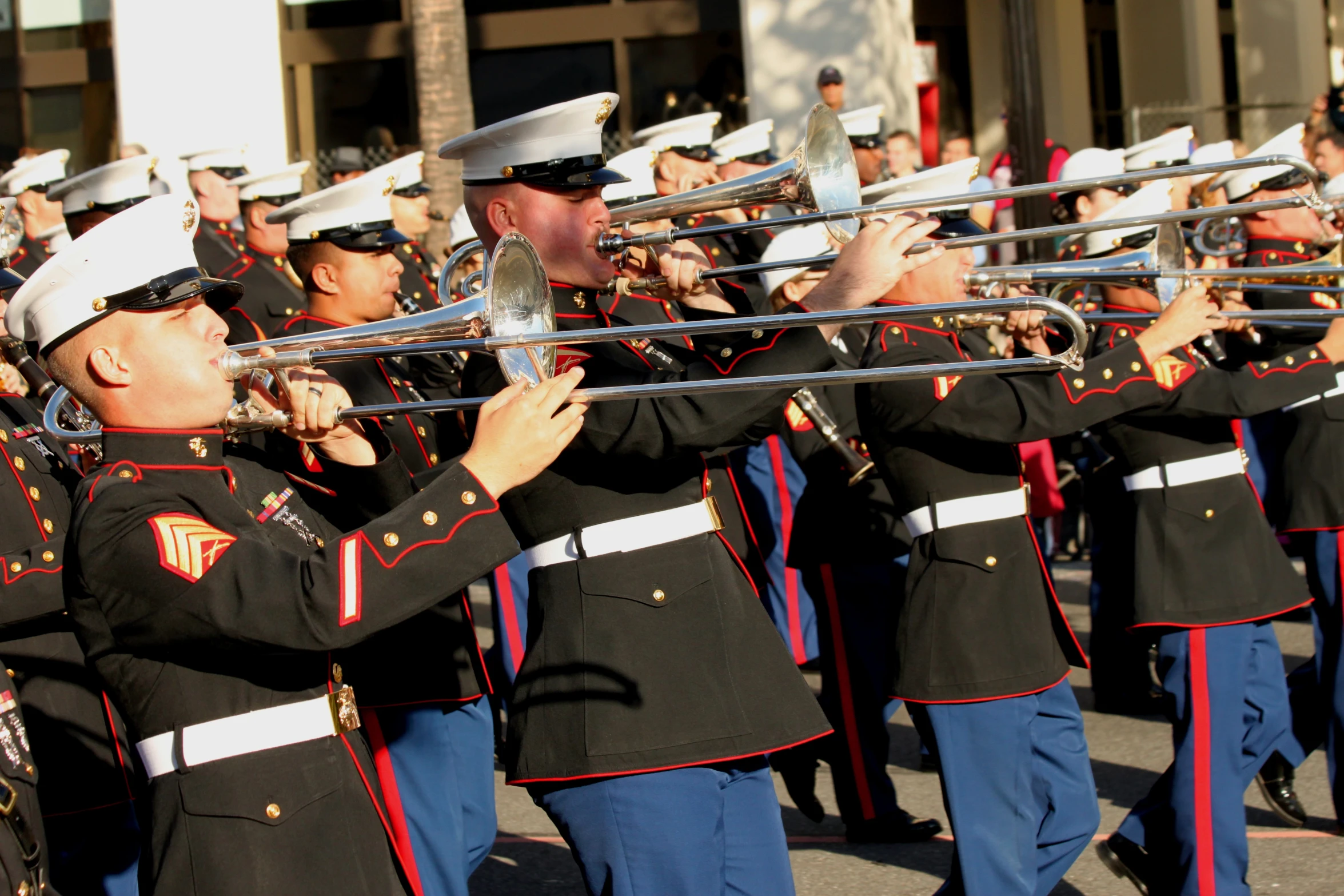 band members in uniform playing music in the street