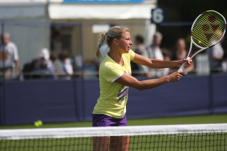 a tennis player about to hit the ball